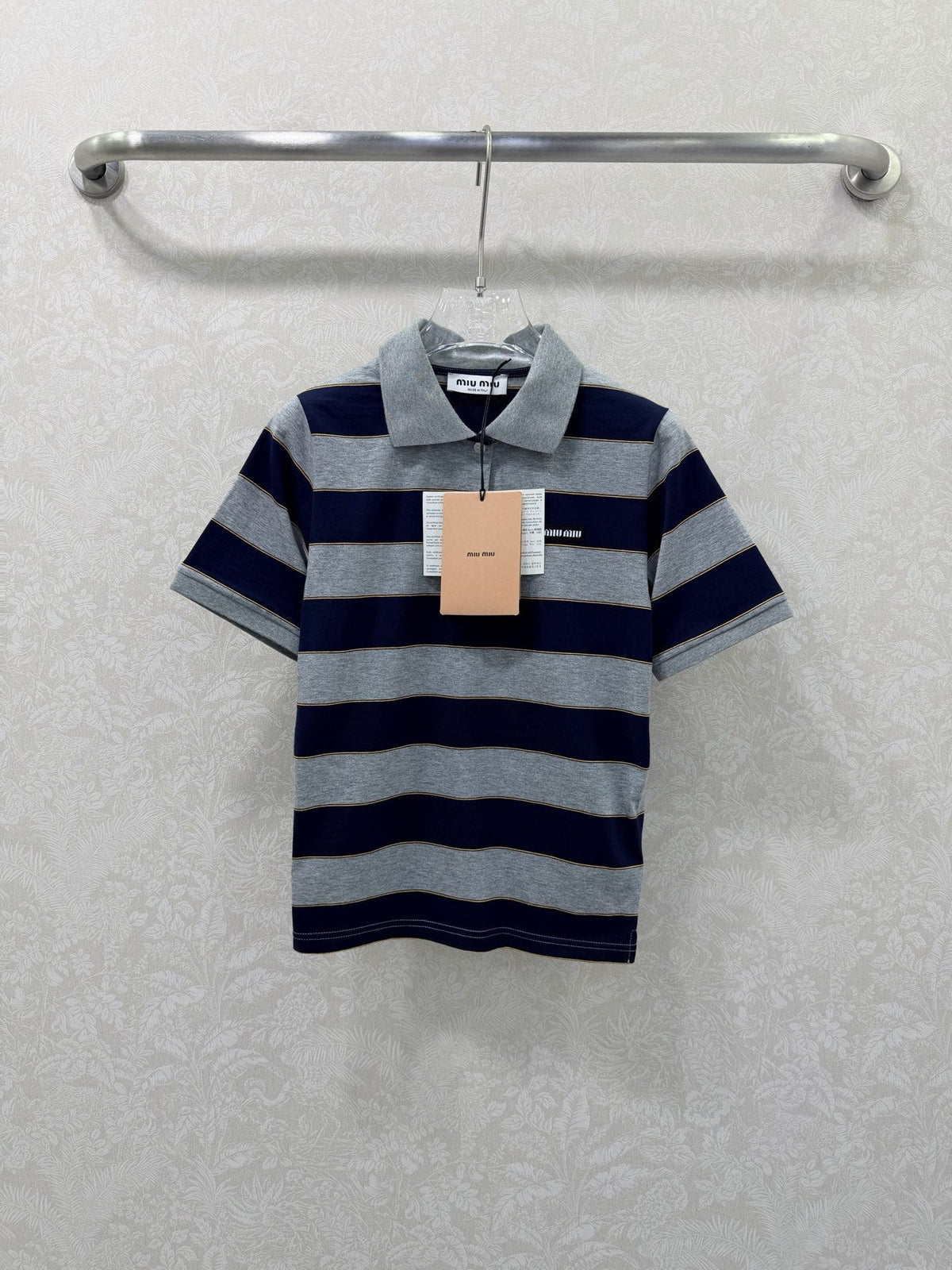 Striped collared short-sleeved polo shirt