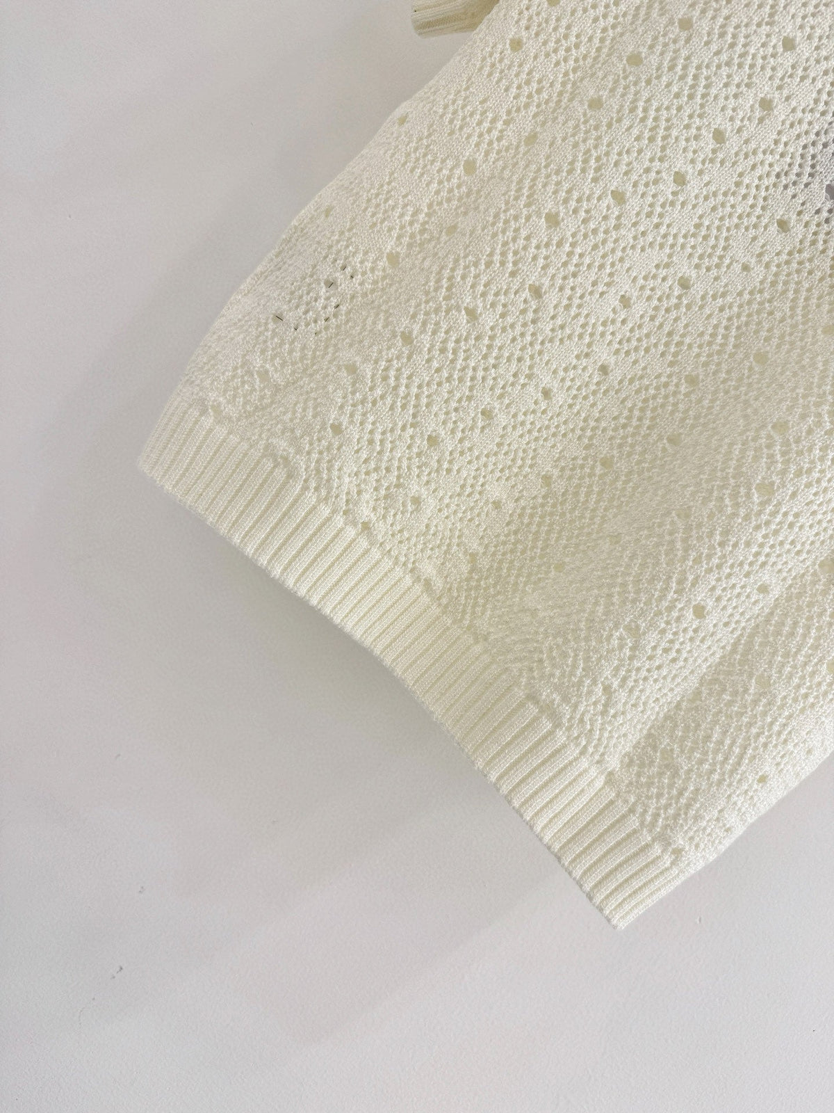 Openwork short-sleeved knit sweater